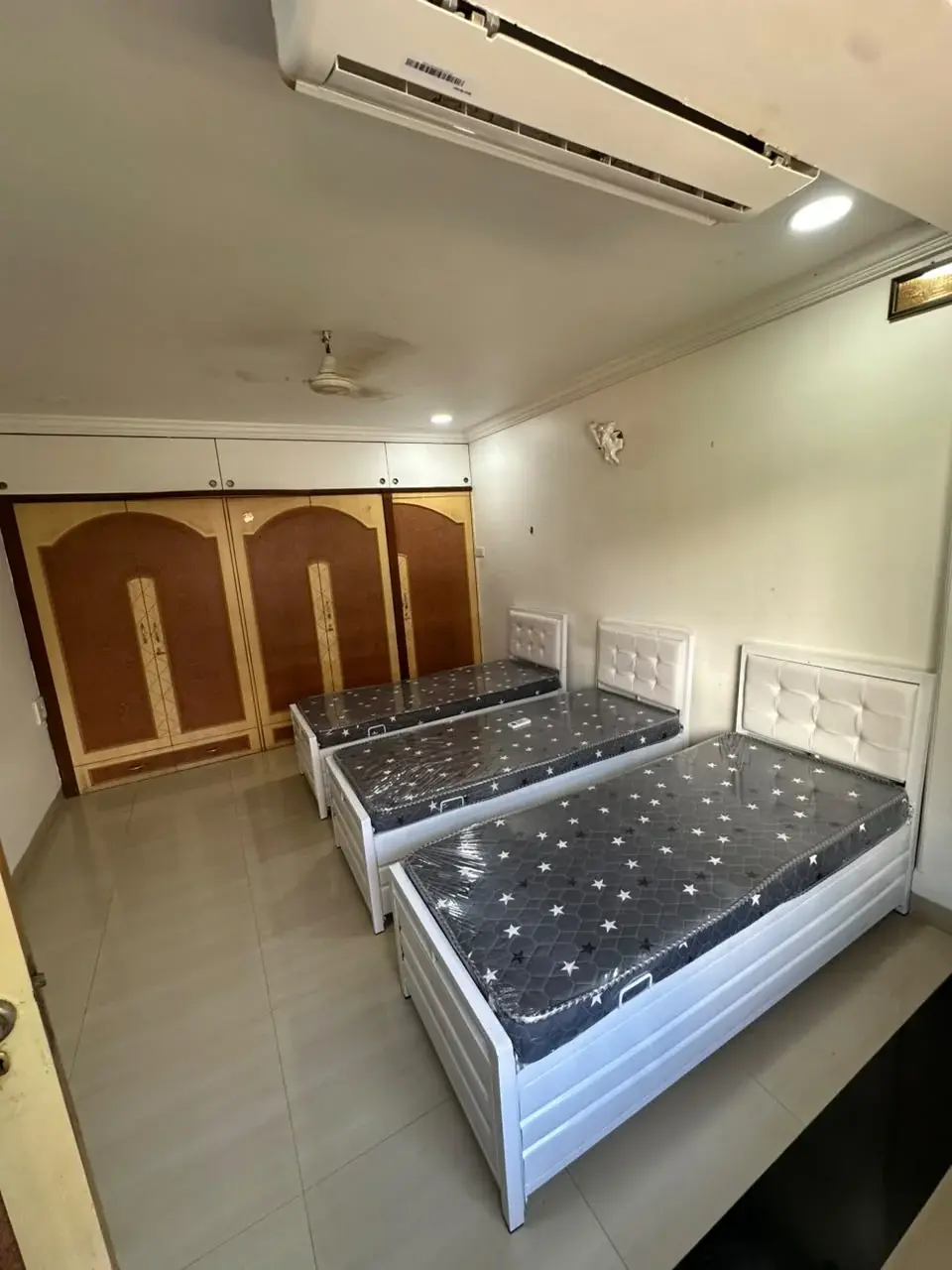 Welcoming entrance of 05 Guest House with marigold garlands